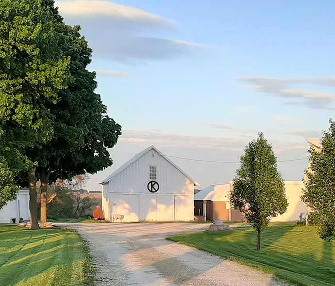 Picture of the Circle K Farmhouse and the road leading up to it